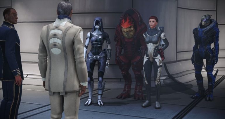 Shepard e integrantes da equipe da Normandy em cena de Mass Effect Legendary Edition